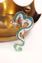 Load image into Gallery viewer, Haku from Spirited Away in enamel pin form! He is cast in gold metal with teal glitter in his mane and tail.