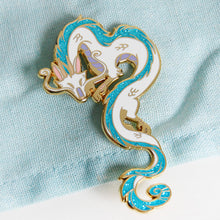 Load image into Gallery viewer, Haku from Spirited Away in enamel pin form! He is cast in gold metal with teal glitter in his mane and tail.