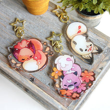 Load image into Gallery viewer, Floral Frolic Bean Glitter Keychains
